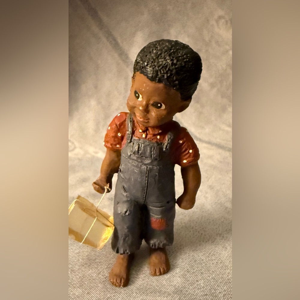 1987 Martha Holcombe Figurine “Jessie” w/Ice Block -Stamp on Foot